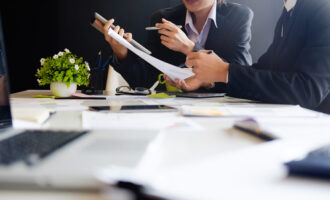 Business,Concept,,Audit,Team,Working,With,Tablet,Computer,And,Paper