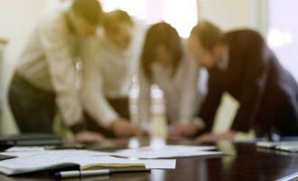 Company,Colleagues,Discussing,Report,Papers,At,Business,Meeting,,Cooperation