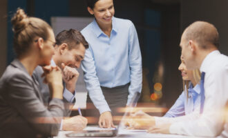 Business,,Technology,And,Office,Concept,-,Smiling,Female,Boss,Talking